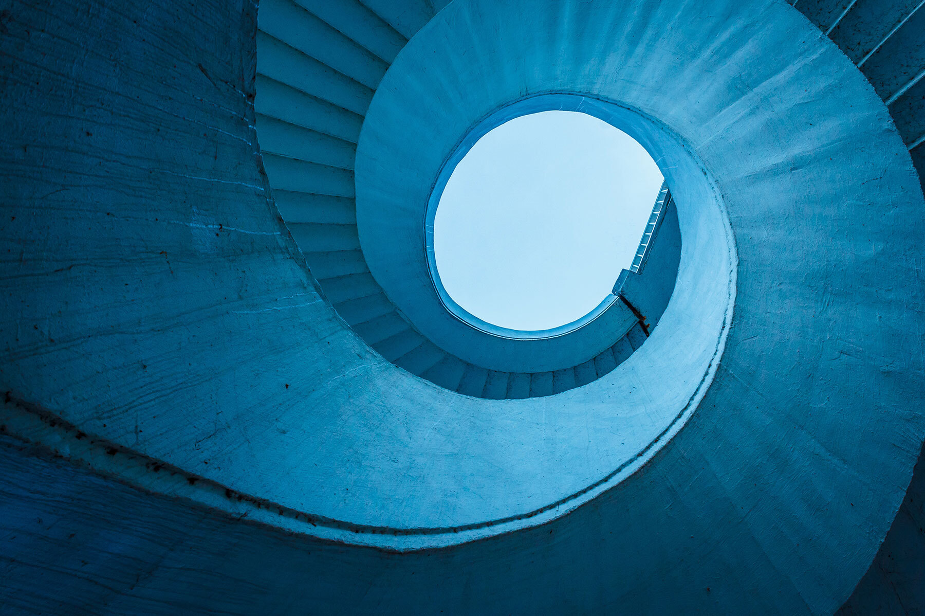 winding staircase shot from ground looking up