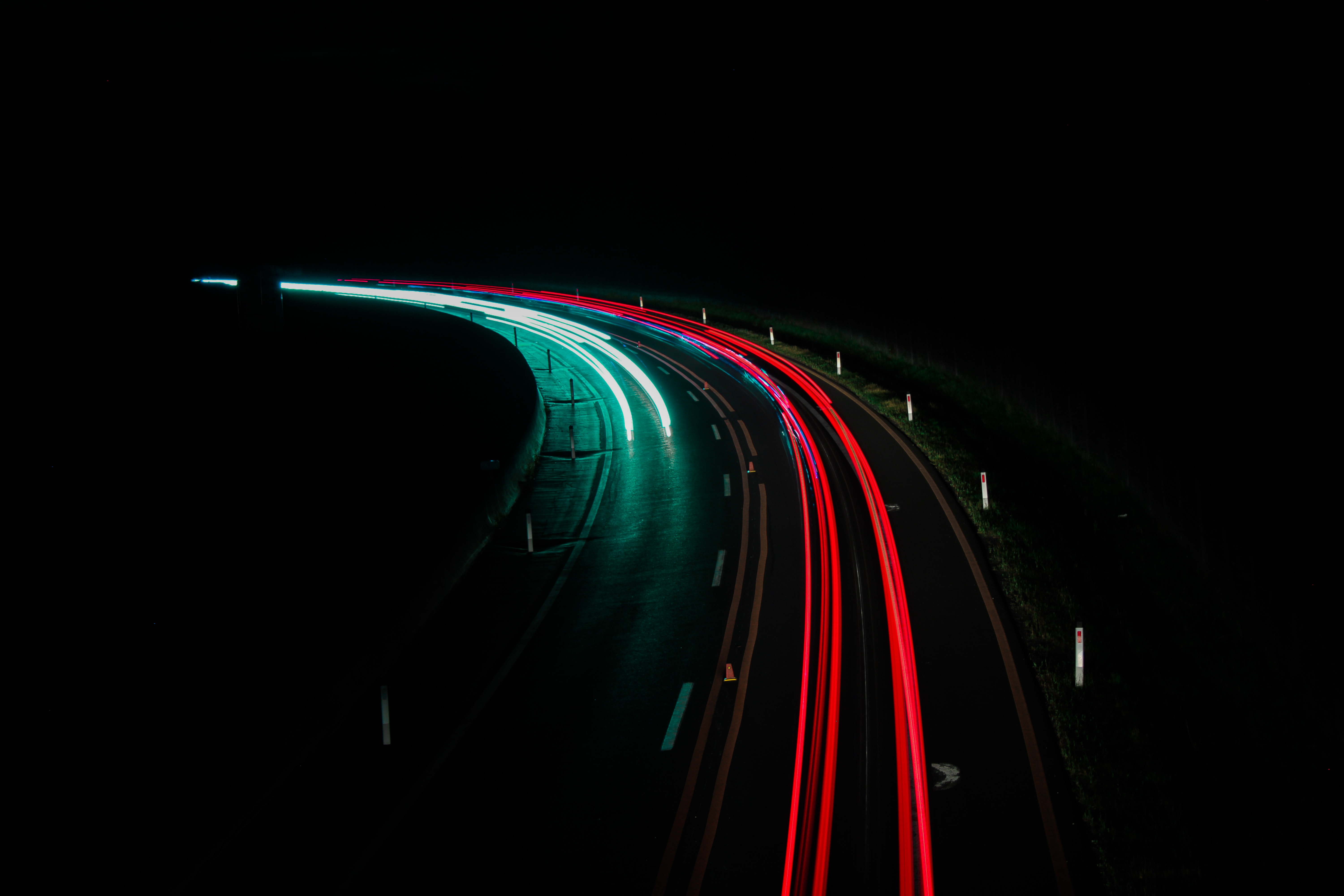 Two lane highway at night timelapse