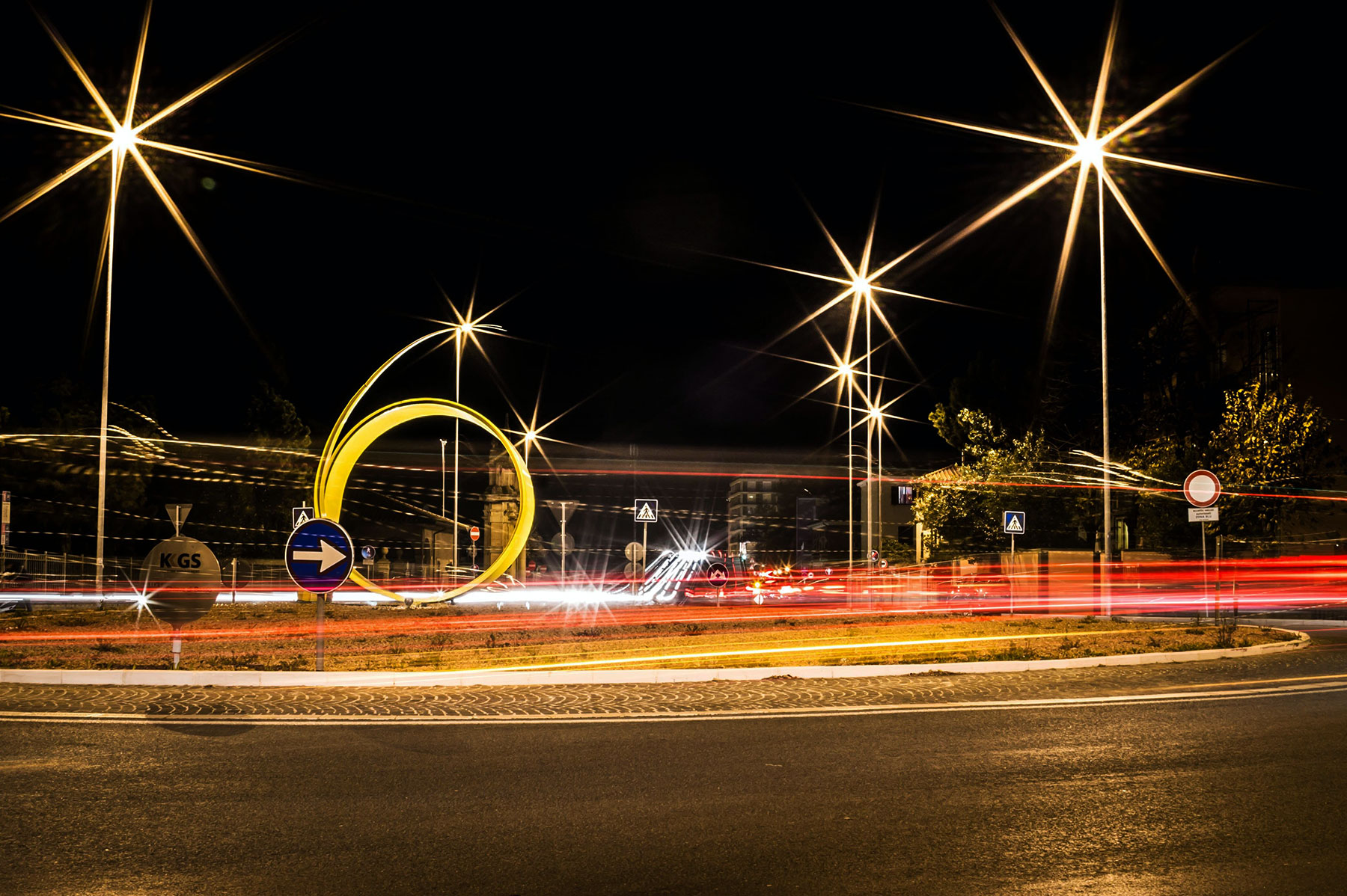 timelapse of car at night with street lights shining