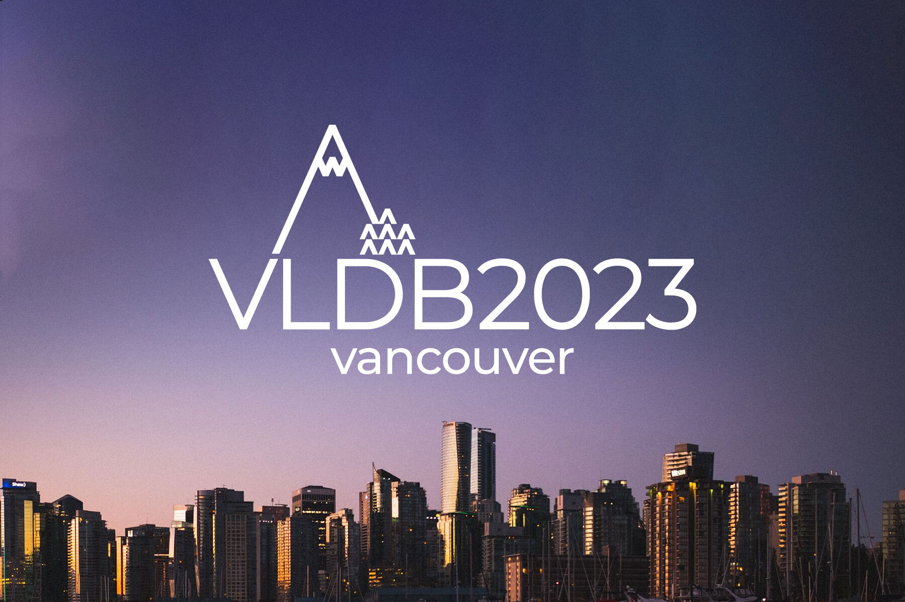 Image of Vancouver, Canada skyline with VLDB 2023 logo on top